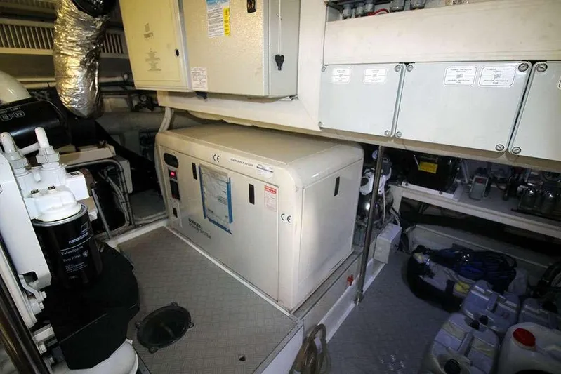  Yacht Photos Pics Engine room of 2006 Ferretti Yachts 780, featuring generator and equipment.