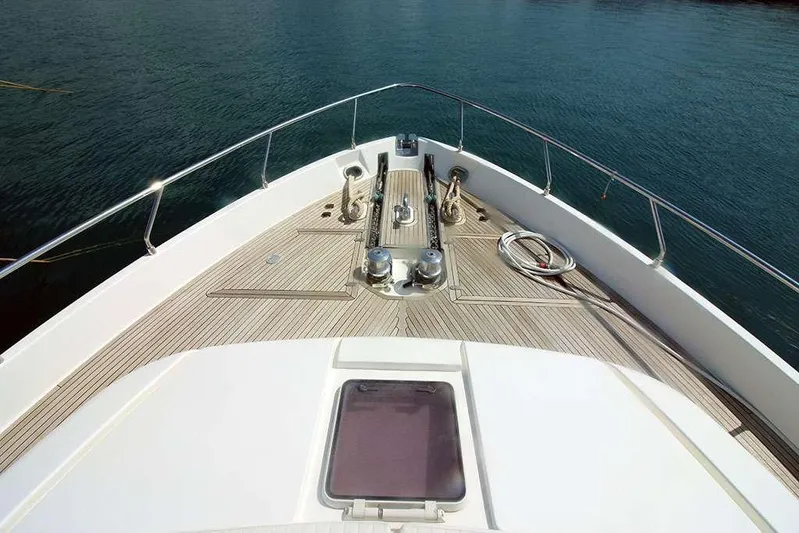  Yacht Photos Pics Bow view of 2006 Ferretti Yachts 780, featuring sleek deck design and ocean backdrop.