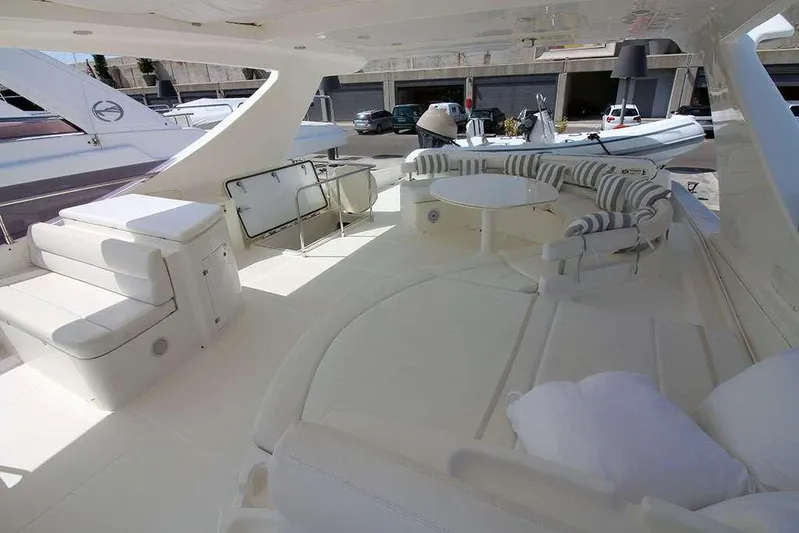  Yacht Photos Pics Luxurious 2006 Ferretti Yachts 780 deck with elegant seating and modern design.
