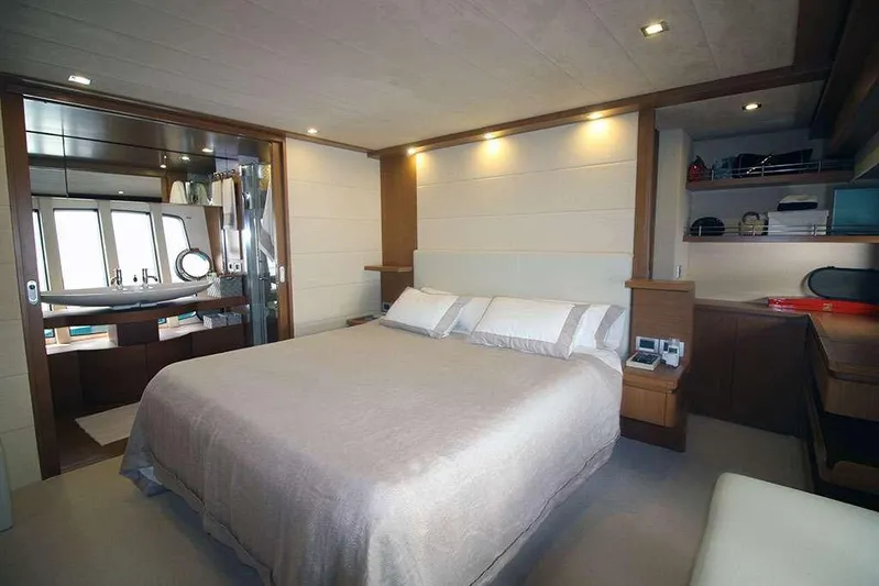  Yacht Photos Pics Luxurious bedroom interior of 2006 Ferretti Yachts 780 with modern design and ambient lighting.