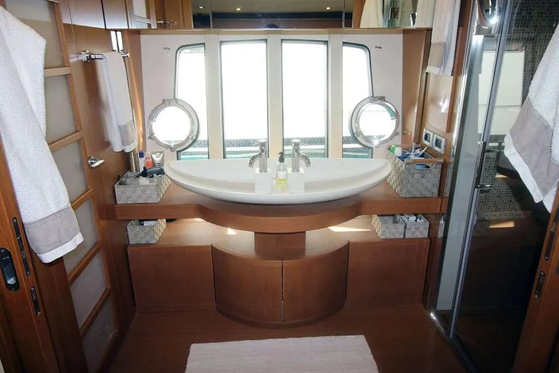  Yacht Photos Pics Luxurious bathroom on 2006 Ferretti Yachts 780 with elegant fixtures and ample natural light.