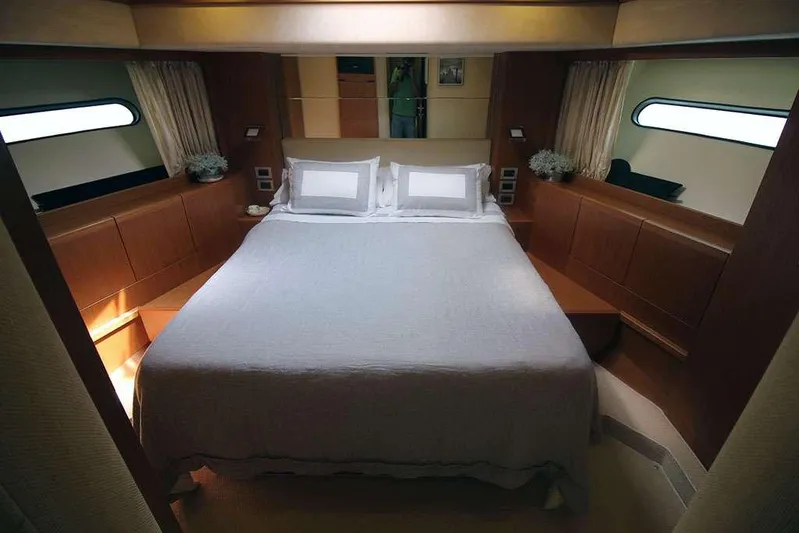  Yacht Photos Pics Luxurious bedroom interior of 2006 Ferretti Yachts 780 with elegant bedding and modern design.