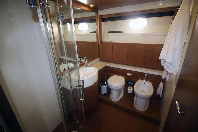  Yacht Photos Pics Luxurious bathroom in 2006 Ferretti Yachts 780, featuring modern fixtures and elegant design.