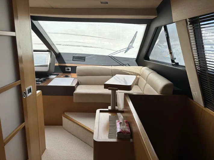  Yacht Photos Pics Luxurious interior of a 2006 Ferretti Yachts 780 with modern seating and helm.