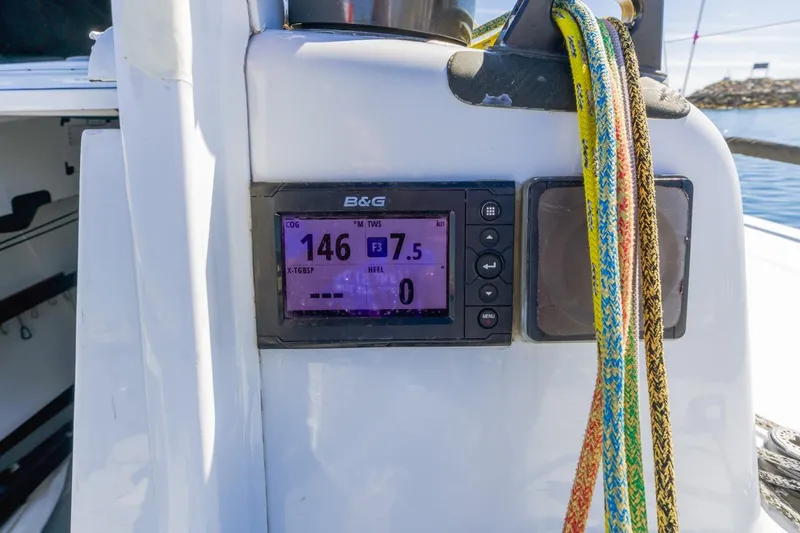 Ground Hog Day Yacht Photos Pics Sailing yacht Rogers 46 (2007) with B&G navigation display and colorful ropes.