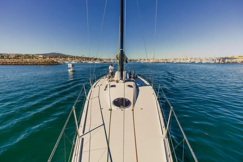 Ground Hog Day Yacht Photos Pics Sailing on a 2007 Rogers 46 yacht in a sunny marina.