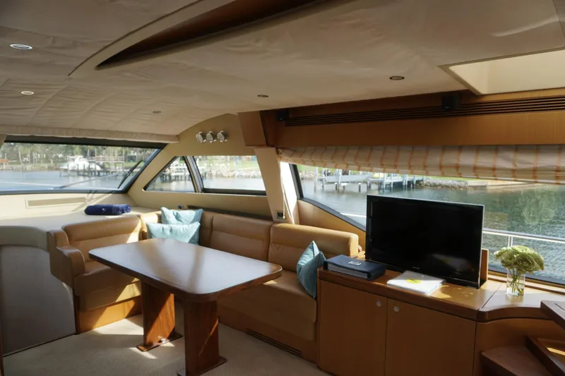 Motor Mile Marine Yacht Photos Pics Luxurious interior of 2008 Ferretti Yachts 630 with elegant seating and scenic window views.