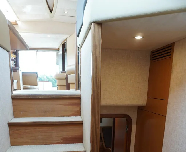 Motor Mile Marine Yacht Photos Pics Interior of 2008 Ferretti Yachts 630, featuring wooden stairs and modern design elements.