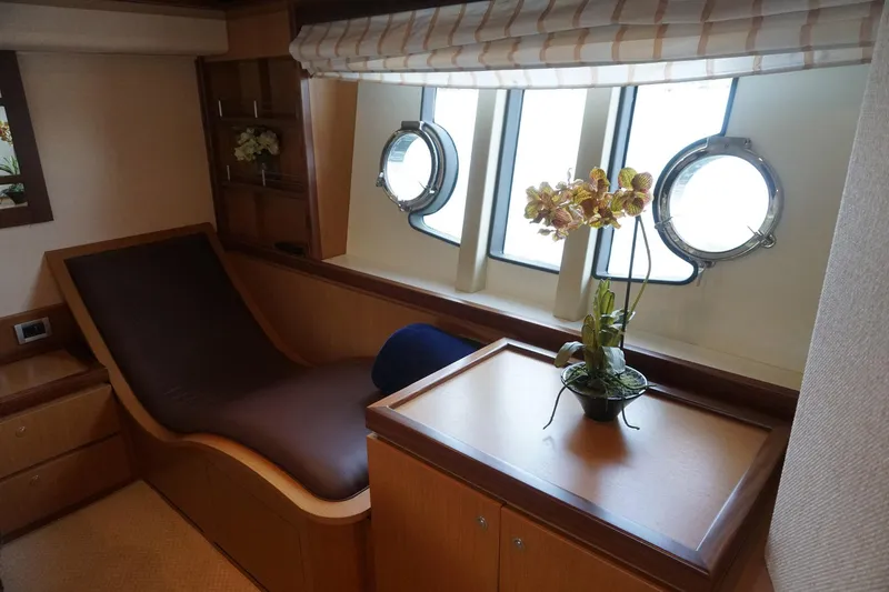 Motor Mile Marine Yacht Photos Pics Luxurious interior of 2008 Ferretti Yachts 630 with elegant seating and porthole windows.