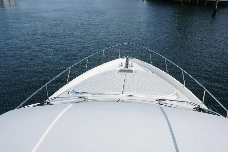 Motor Mile Marine Yacht Photos Pics Bow view of 2008 Ferretti Yachts 630 on calm water.
