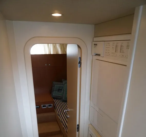 Motor Mile Marine Yacht Photos Pics Interior of 2008 Ferretti Yachts 630, featuring a cozy cabin and modern amenities.