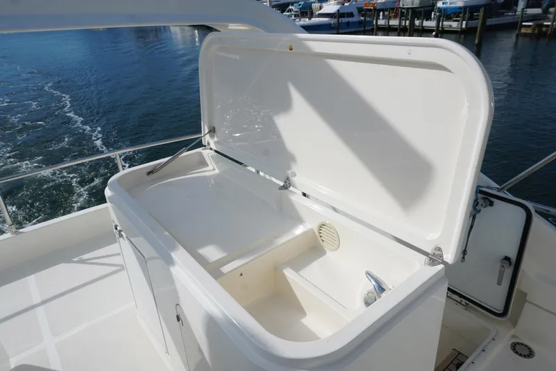 Motor Mile Marine Yacht Photos Pics Open storage compartment on 2008 Ferretti Yachts 630, dockside view.