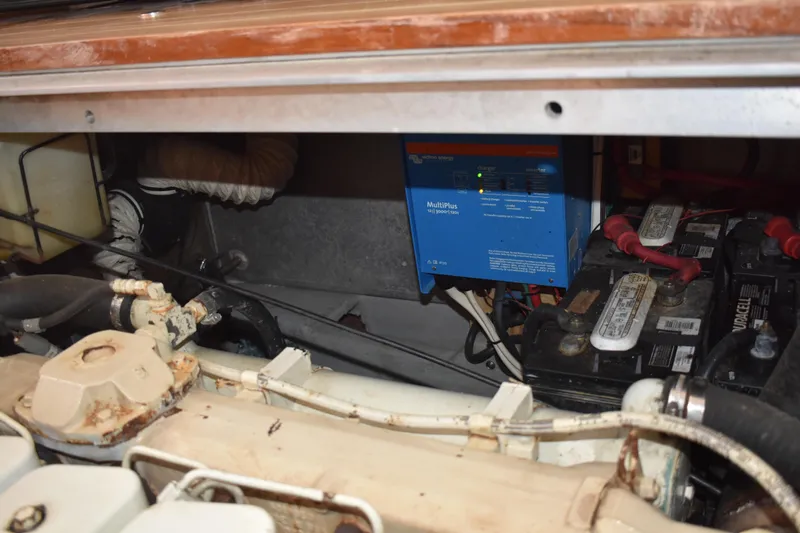  Yacht Photos Pics Engine compartment of a 2001 Mainship 390 with batteries and electrical components.