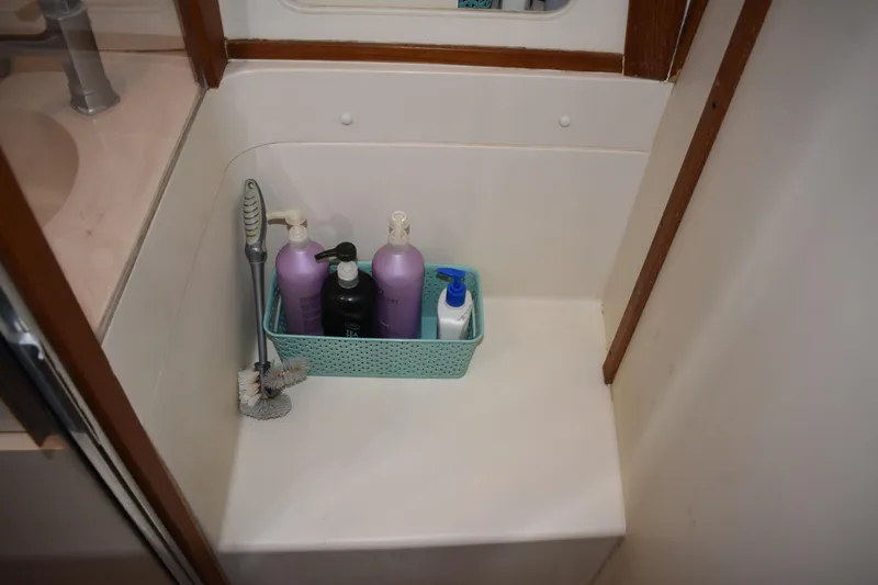  Yacht Photos Pics Bathroom corner with toiletries in a Mainship 390, 2001 model.
