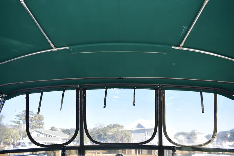  Yacht Photos Pics Interior view of 2001 Mainship 390 boat canopy with clear windows.