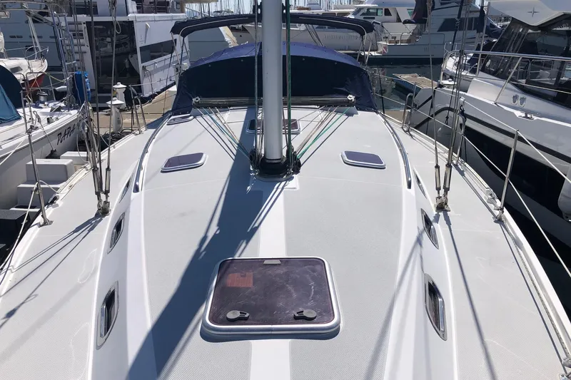 Makani Yacht Photos Pics 2008 Catalina 42 MkII sailboat deck view at marina, showcasing sleek design and rigging.