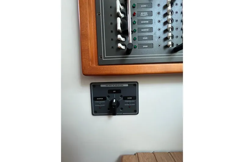 True Love Yacht Photos Pics Electrical panel on a 2009 MJM 29z Express boat, featuring switches and controls.