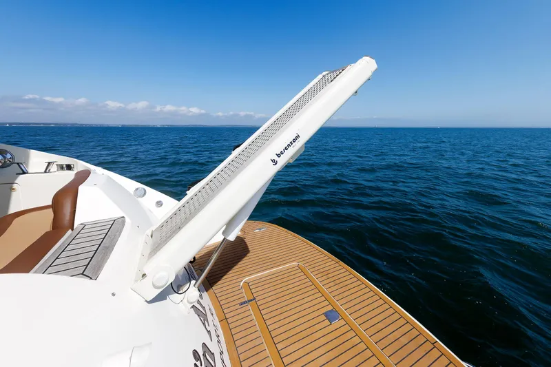 Tool N' Around Yacht Photos Pics Aicon Yachts 56 Flybridge 2005 with open gangway over ocean.