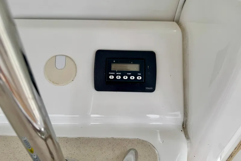 A Mi Manera Yacht Photos Pics Control panel on 2007 Sea Ray 40 Motor Yacht, featuring power and temperature settings.