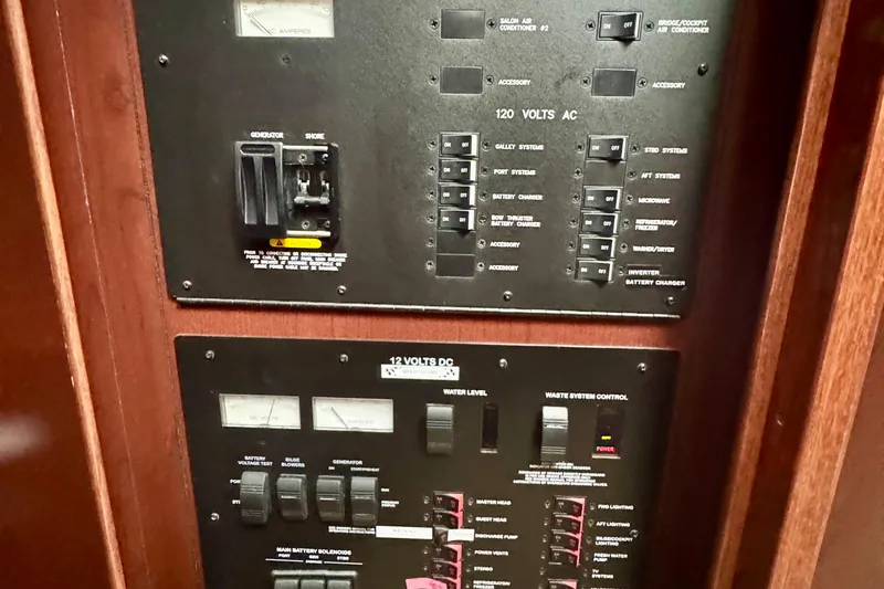 A Mi Manera Yacht Photos Pics Electrical control panel on a 2007 Sea Ray 40 Motor Yacht, featuring AC and DC systems.