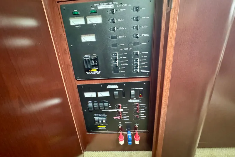 A Mi Manera Yacht Photos Pics Electrical control panel on a 2007 Sea Ray 40 Motor Yacht, featuring various switches and meters.