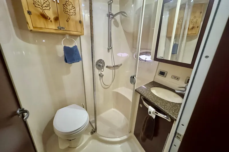 A Mi Manera Yacht Photos Pics Luxurious bathroom in 2007 Sea Ray 40 Motor Yacht with shower and vanity.