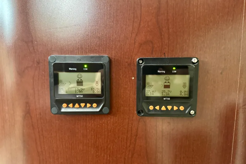 A Mi Manera Yacht Photos Pics Control panels on 2007 Sea Ray 40 Motor Yacht, displaying system information.