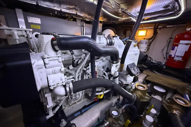 A Mi Manera Yacht Photos Pics Engine room of a 2007 Sea Ray 40 Motor Yacht, showcasing mechanical components and systems.