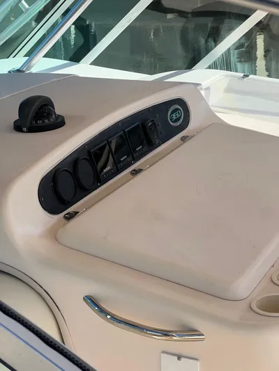  Yacht Photos Pics 2006 Grady-White 360 Express dashboard with control panel and compass.