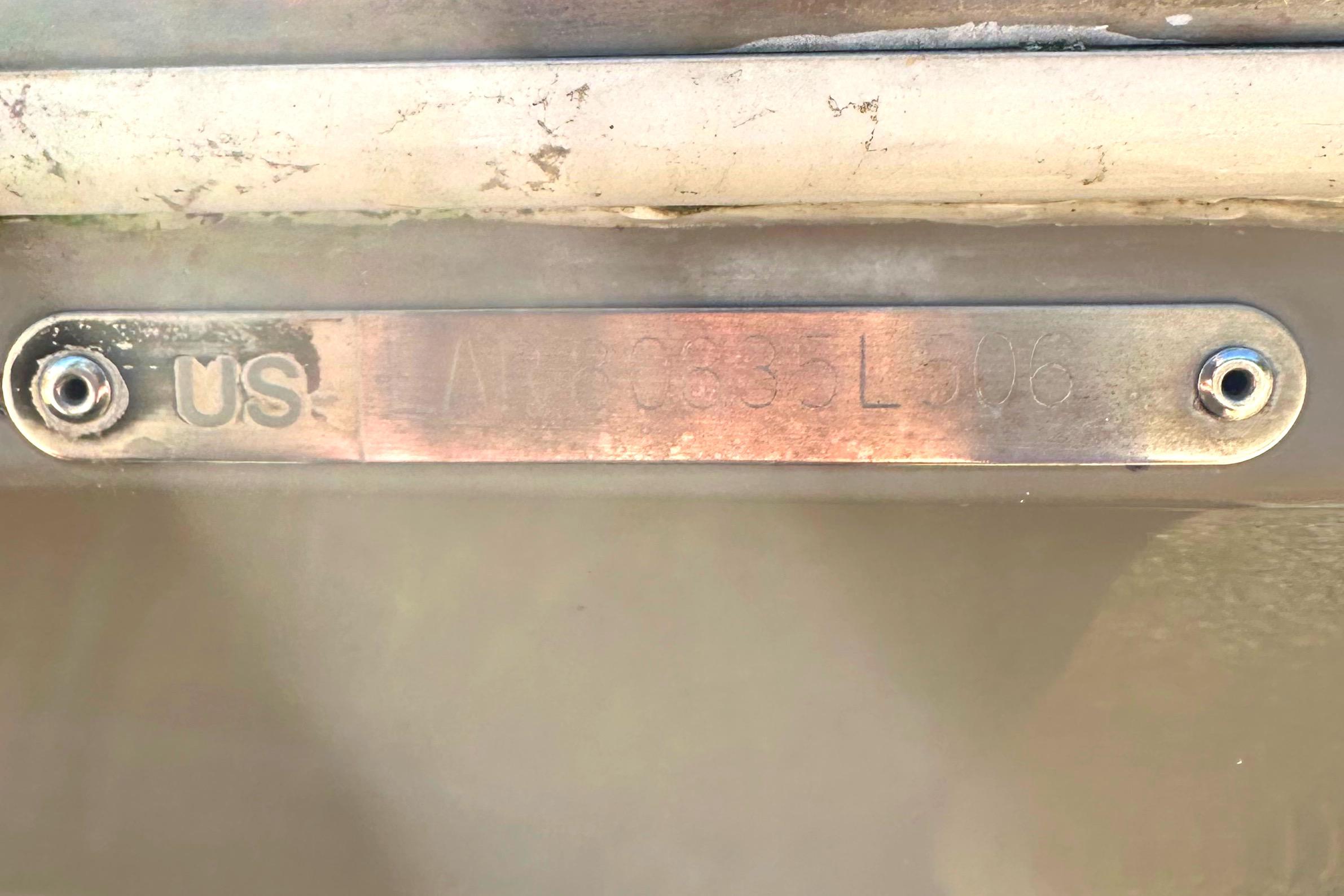 2006 Larson Cabrio 350 boat identification plate with visible serial number.