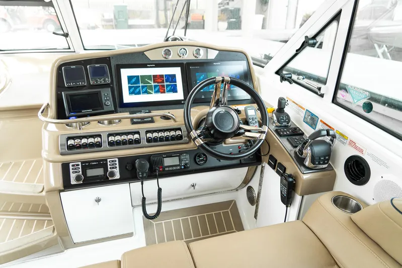  Yacht Photos Pics 2016 Formula 45 Yacht cockpit with advanced navigation controls and luxurious interior design.