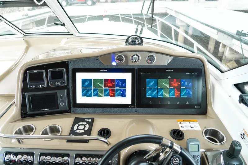  Yacht Photos Pics Control panel of a 2016 Formula 45 Yacht with dual navigation screens.