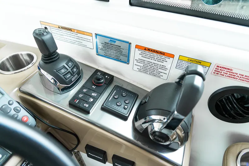  Yacht Photos Pics Control panel of a 2016 Formula 45 Yacht with joystick and throttle controls.