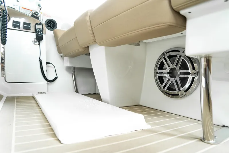  Yacht Photos Pics 2016 Formula 45 Yacht interior with beige seating, speaker, and control panel.