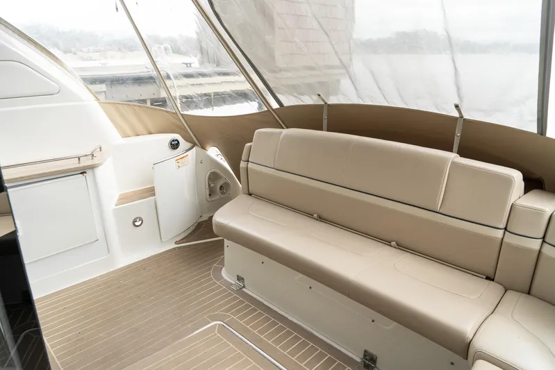  Yacht Photos Pics 2016 Formula 45 Yacht interior with beige seating and wood flooring.