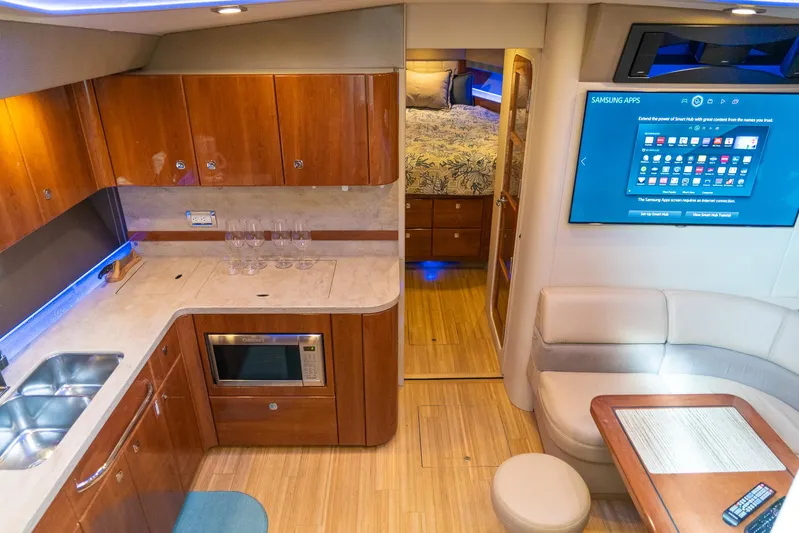  Yacht Photos Pics Interior of 2016 Formula 45 Yacht with kitchen, seating area, and modern amenities.
