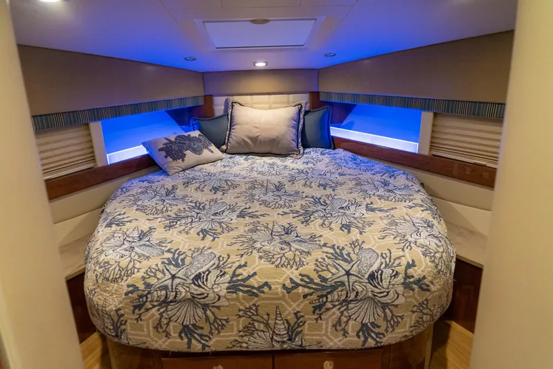  Yacht Photos Pics Luxurious bedroom interior of 2016 Formula 45 Yacht with elegant bedding and ambient lighting.
