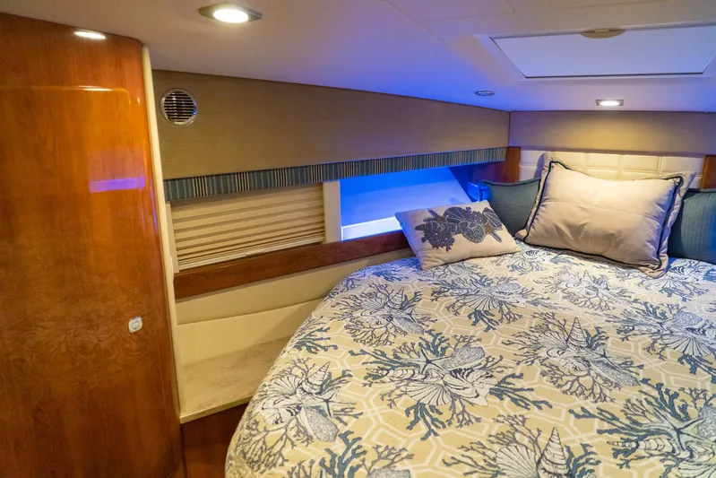  Yacht Photos Pics Luxurious bedroom interior of 2016 Formula 45 Yacht with elegant bedding and ambient lighting.