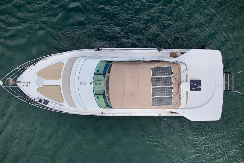  Yacht Photos Pics Overhead view of 2002 Carver 466 Motor Yacht with solar panels on deck.