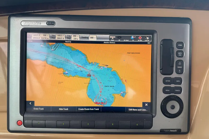  Yacht Photos Pics Raymarine navigation system on 2002 Carver 466 Motor Yacht displaying nautical chart.