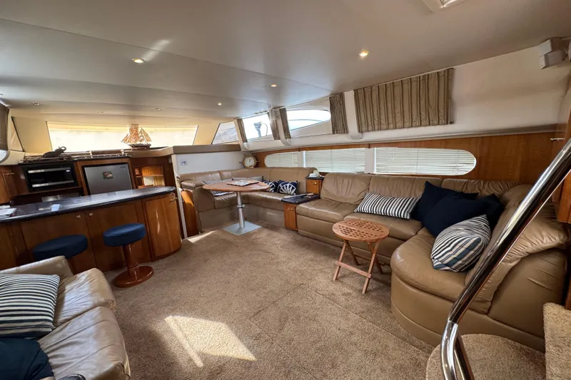  Yacht Photos Pics Luxurious interior of 2002 Carver 466 Motor Yacht with plush seating and modern amenities.