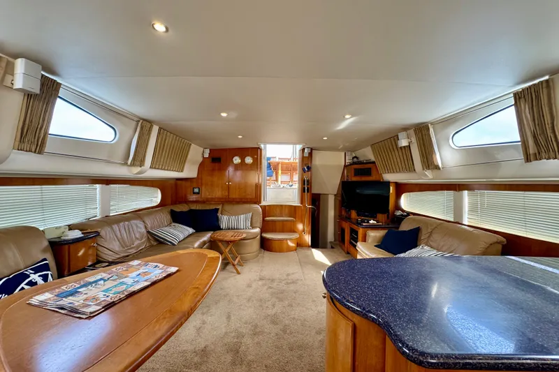 Yacht Photos Pics Luxurious interior of 2002 Carver 466 Motor Yacht with plush seating and modern amenities.