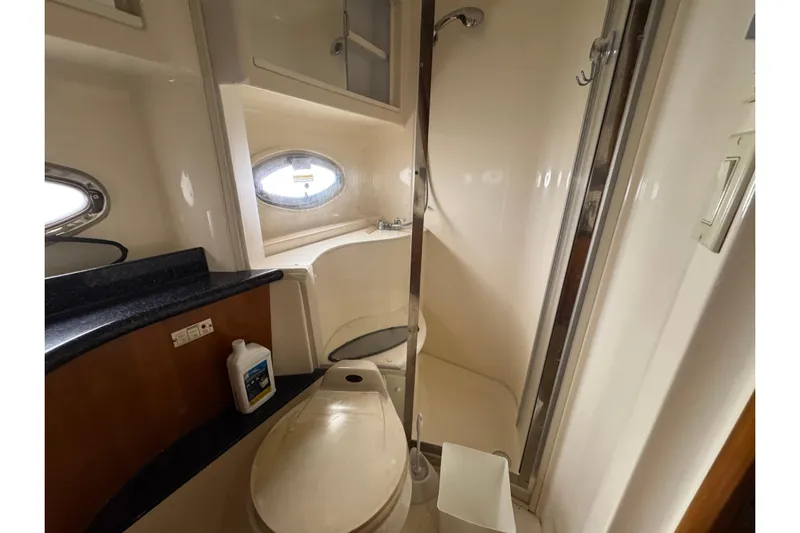  Yacht Photos Pics Bathroom interior of 2002 Carver 466 Motor Yacht with shower and toilet.