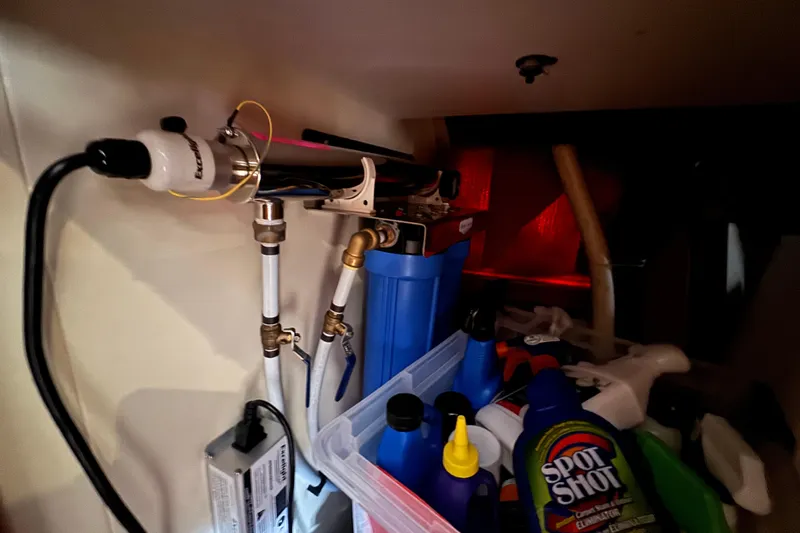  Yacht Photos Pics Interior of Carver 466 Motor Yacht 2002 with cleaning supplies.