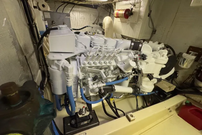 Leto Yacht Photos Pics Engine room of a 2001 American Tug 34, showcasing detailed mechanical components.