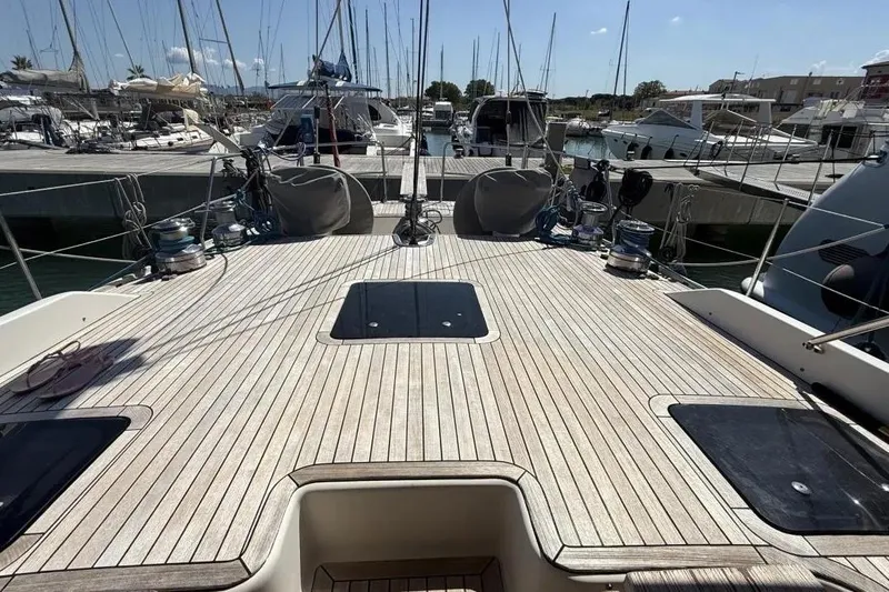  Yacht Photos Pics 2009 Franchini 63 S yacht deck with marina view, showcasing sleek design and craftsmanship.