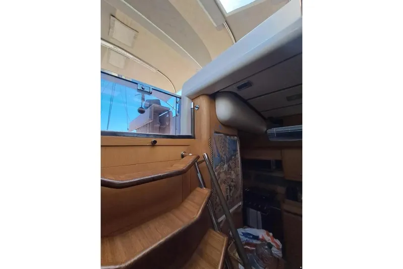  Yacht Photos Pics Interior view of 2009 Franchini 63 S yacht with wooden stairs and modern design.