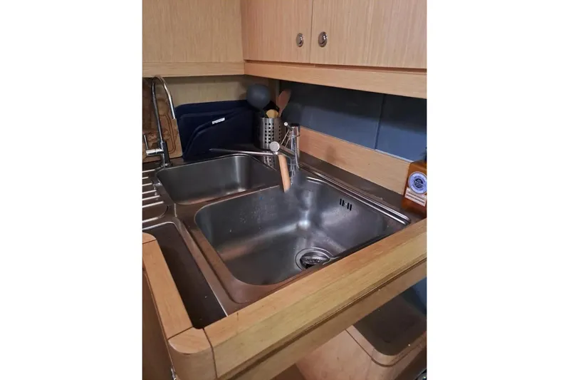  Yacht Photos Pics Kitchen sink area in a 2009 Franchini 63 S yacht, featuring stainless steel fixtures.
