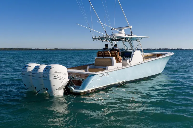 Wahoo Whitney Yacht Photos Pics 2022 Valhalla Boatworks V-37 on water, featuring triple Mercury outboard engines.