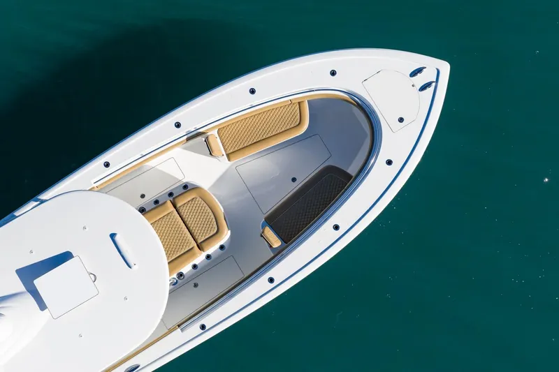 Wahoo Whitney Yacht Photos Pics 2022 Valhalla Boatworks V-37, aerial view of bow seating area on calm water.